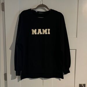 Oversized sweatshirt. Size small. “Mami”